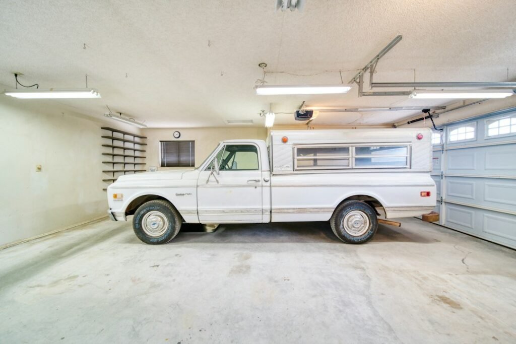 White commercial van in a garage workshop